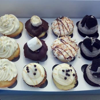 Fluffy Thoughts Cakes - One dozen specialty cupcakes: 3 tres leches, 2 smores, 2 samoas, 3 cookies and cream, and 2 candy bar crunch - Bakeries Near Me - McLean, Virginia