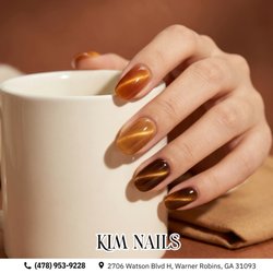 Honey amber cat-eye! Glossy squoval nails glow with multi-tonal caramel and espresso magnetic velvet shimmer. Perfect for fall! Book!