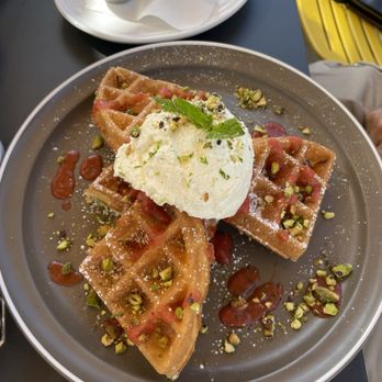 Poached Kitchen - Strawberry rhubarb waffle with lime zest and pistachio - Coffee & Tea Near Me - Anaheim, California Poached Kitchen - Strawberry rhubarb waffle with lime zest and pistachio - Coffee & Tea Near Me - Anaheim, California