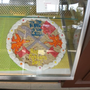 Cookies By Design - a birthday cake in a glass case - Bakeries Near Me - St. Louis, Missouri Cookies By Design - a birthday cake in a glass case - Bakeries Near Me - St. Louis, Missouri