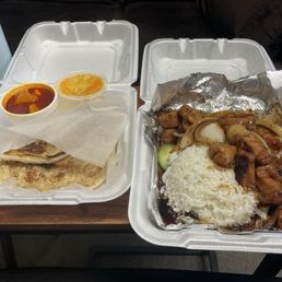 Roti with curry and Butter fried chicken. Roti with curry and Butter fried chicken.