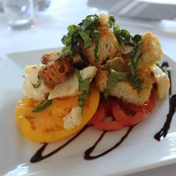 Season - Heirloom Panzanella Salad Local heirloom tomatoes & basil, parmigiano reggiano chunks, toasted bread, banyuls vinaigrette.