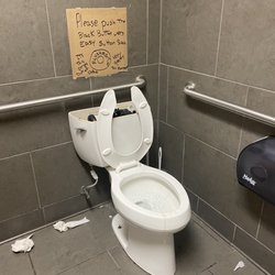 7-Eleven - Unprofessional sign, dirty toilet paper