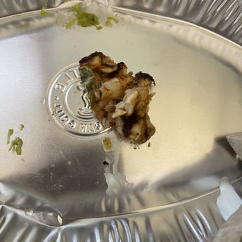 Chipotle Mexican Grill - a half eaten piece of food - Mexican Near Me - Amherst, New York