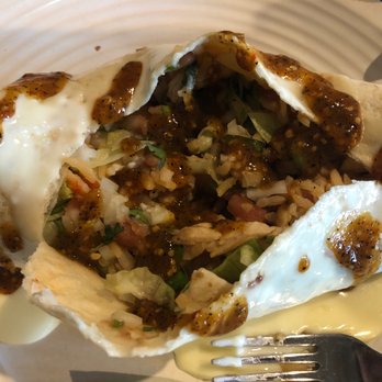 Mi Lindo Mexico - Grilled chicken burrito stuffed with veggies rice and beans drizzled in bravo sauce. Yummy for yo tummy. - Mexican Near Me - Des Moines, Iowa