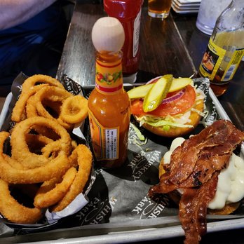 Whiskey Park - Burger with onion rings - Whiskey Bars Near Me - Naples, Florida Whiskey Park - Burger with onion rings - Whiskey Bars Near Me - Naples, Florida