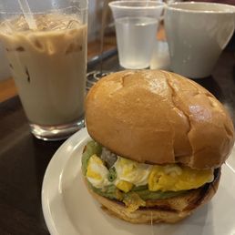 Cali turkey breakfast sandwich, lavender iced coffee with oat milk Cali turkey breakfast sandwich, lavender iced coffee with oat milk