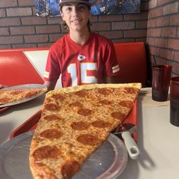 Monster slice of pizza