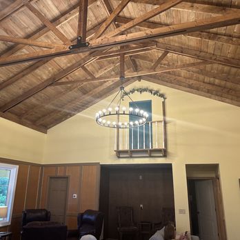 Christian Paul Vineyards - a living room with a chandelier - Wine Tasting Room Near Me - Elkin, North Carolina Christian Paul Vineyards - a living room with a chandelier - Wine Tasting Room Near Me - Elkin, North Carolina