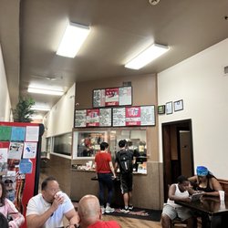 Philly Steaks - Inside the joint. The right door is the entrance to the bar. We didn't drink anything that day so can't speak on their drinks.