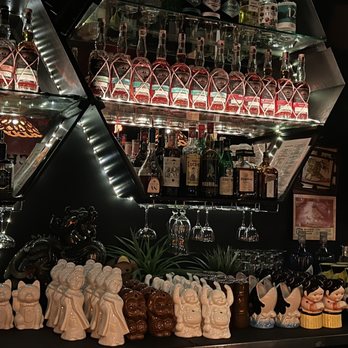Chez Tao! - a bar with a lot of bottles and glasses - Pan Asian Near Me - Quebec City, Quebec Chez Tao! - a bar with a lot of bottles and glasses - Pan Asian Near Me - Quebec City, Quebec