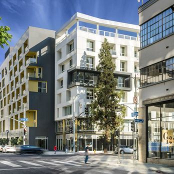 G12 - A city street with cars and buildings. - Apartments Near Me - Los Angeles, California