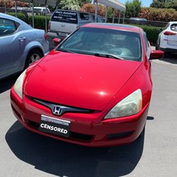 Dan's Auto Body - car
