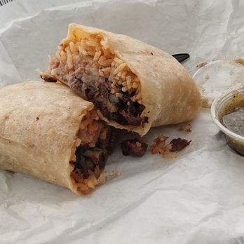 Taka Taka Tacos - Carne Asada Burrito with fresh green salsa - Mexican Near Me - Commerce, California Taka Taka Tacos - Carne Asada Burrito with fresh green salsa - Mexican Near Me - Commerce, California