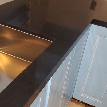 Verona Quartz Surfaces - Jet black slab. Zero scratches. Solid color. - Building Supplies Near Me - Sun Valley, California Verona Quartz Surfaces - Jet black slab. Zero scratches. Solid color. - Building Supplies Near Me - Sun Valley, California