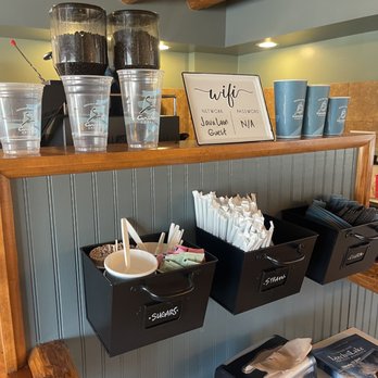 Java Loon - a display of various items on a shelf - Coffee & Tea Near Me - Walker, Minnesota