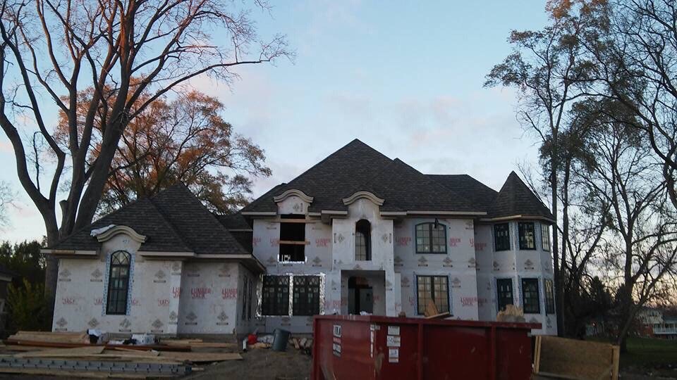 Slide of SNE Roofing & Remodeling