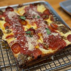 Thunderbird Pies - Pepperoni and sausage pizza.