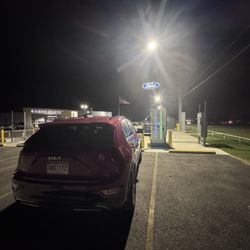 Budget Car Rental - Me and the stupid car charging in the middle of nowhere at 1 am.