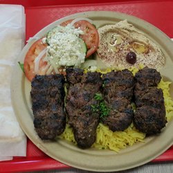 Jasmine Kitchen - Beeft Kifta Kebab - served with rice, salad, hummus, and pita bread.