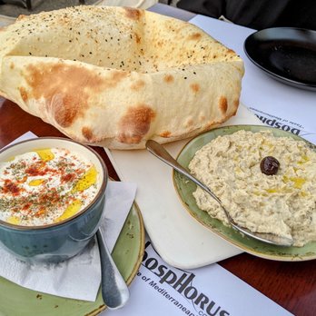 Bosphorus Cafe Grill - Lavas Hollow Bread, separately ordered hummus and tzatziki. - Mediterranean Near Me - Port Washington, New York Bosphorus Cafe Grill - Lavas Hollow Bread, separately ordered hummus and tzatziki. - Mediterranean Near Me - Port Washington, New York