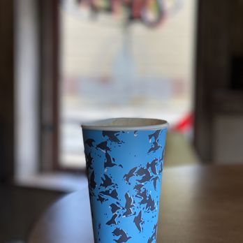 Divino Gelato Cafe - a cup of coffee on a table - Gelato Near Me - Racine, Wisconsin