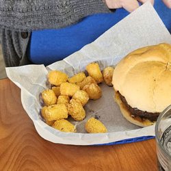 Tuesday's Bar & Grill - Char broiled Hamburger & Swiss Cheese & Tater Tots. Delicious