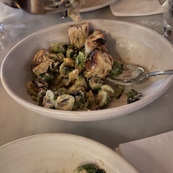 Serious Pie Downtown - Roasted Brussels with caesar dressing, olives, and focaccia croutons - Pizza Near Me - Seattle, Washington