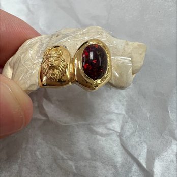 Sheikh Jewelers - First mistake: lion head small, opal is round with wrong color and no diamond cuts or diamond dust. - Jewelry Near Me - Sacramento, California Sheikh Jewelers - First mistake: lion head small, opal is round with wrong color and no diamond cuts or diamond dust. - Jewelry Near Me - Sacramento, California