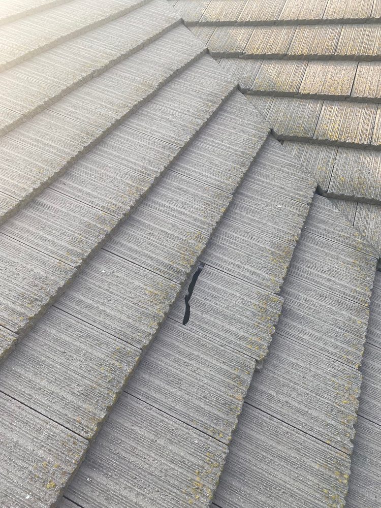 Slide of oscar Roofing