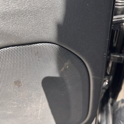 A Professional Touch - Smeared gunk on my speaker in the back passage door.