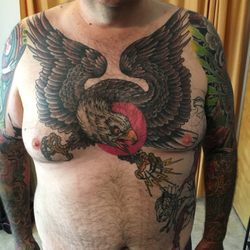 Inkvision Tattoo - Erik Payne tattooed to this eagle on me over a couple seasons.