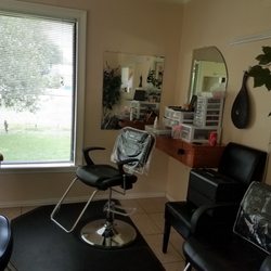 Yvette's Beauty Designs - One of the stylist chair in a separate room