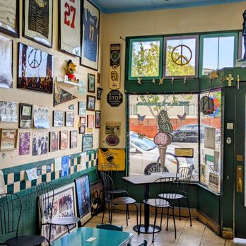 Mariposa Ice Cream - tables and chairs in front of a window - Ice Cream & Frozen Yogurt Near Me - San Diego, California