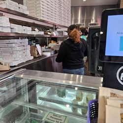 Inside at the counter.