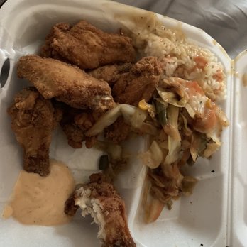 The Good Kitchen - This is the Fried Chicken Wings and cabbage with rice and gravy it was like this when I opened it all tossed around - Soul Food Near Me - Columbus, Ohio