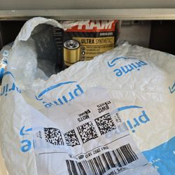 US Post Office - This is the oil filter the two women from the Post Office jammed into a paper mail slot. It cannot be removed. Thanks girls...