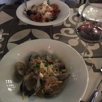 Grotto Downtown - Vongole Pasta (clam linguine with pinot grigio broth), Pescatore Pasta (seafood linguine with tomato basil broth) - Italian Near Me - Houston, Texas Grotto Downtown - Vongole Pasta (clam linguine with pinot grigio broth), Pescatore Pasta (seafood linguine with tomato basil broth) - Italian Near Me - Houston, Texas