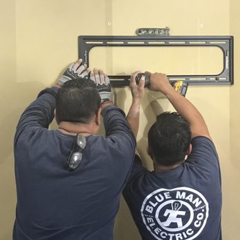 Blue Man - Rudy and Geovanny placing TV brackets. - Electricians Near Me - Santa Fe Springs, California Blue Man - Rudy and Geovanny placing TV brackets. - Electricians Near Me - Santa Fe Springs, California