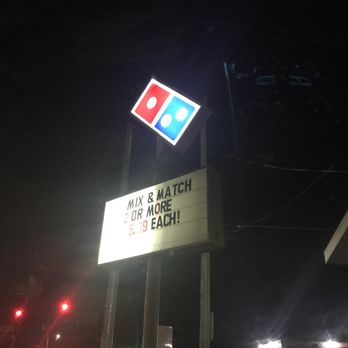 Domino's Pizza - a sign for a restaurant - Pizza Near Me - Saginaw, Michigan