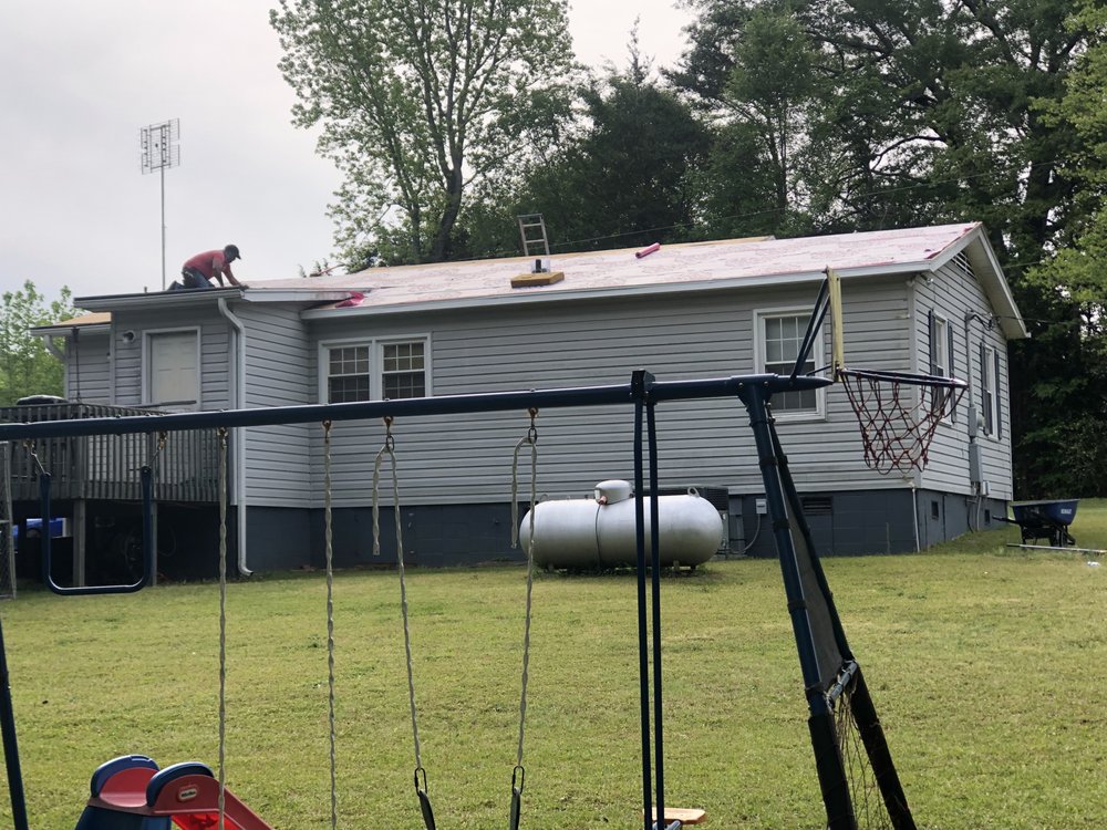 Slide of Ray's Roofing & Restoration