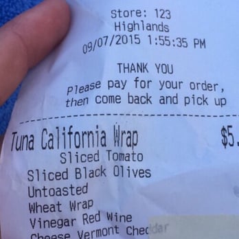 QuickChek - a person holding a receipt - Convenience Stores Near Me - Highlands, New Jersey