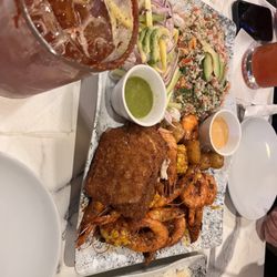 4 person platter with rice. Ceviche Aguachiles fried fish shrimp