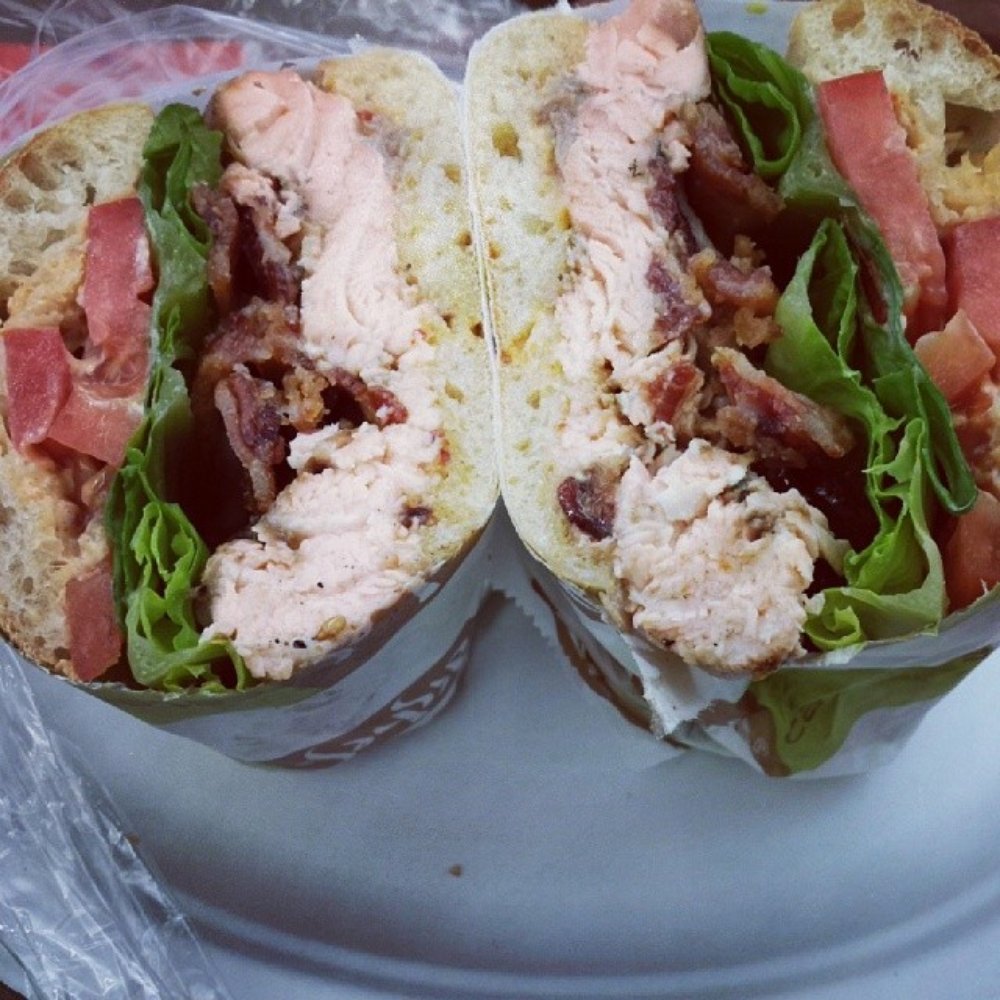 Possibly the best sandwich ever! House smoked salmon with candied bacon lettuce tomato on a ciabatta