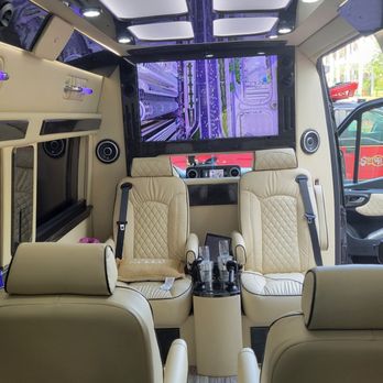Chariottz Car Service - Front facing interior photo of Luxury Van with bar - Town Car Service Near Me Chariottz Car Service - Front facing interior photo of Luxury Van with bar - Town Car Service Near Me