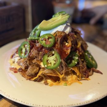 Jason Aldean’s Kitchen + Bar - Nachos - were bomb! Shareable between two - Bars Near Me - Las Vegas, Nevada Jason Aldean’s Kitchen + Bar - Nachos - were bomb! Shareable between two - Bars Near Me - Las Vegas, Nevada