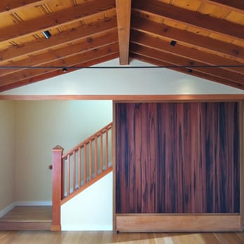 Dialogue Design Build - Interior sliding door in salvaged water-tank redwood. - General Contractors Near Me - Berkeley, California