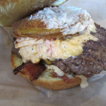 Moxie Burger - Moxie Burger - 6 oz. ground beef, bacon, fried tomato, pimento cheese, and "Moxie" sauce (mayonnaise-based sauce). - Burgers Near Me - Marietta, Georgia
