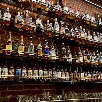 The Green Room - a wall full of liquor bottles - Cocktail Bars Near Me - Portland, Oregon The Green Room - a wall full of liquor bottles - Cocktail Bars Near Me - Portland, Oregon