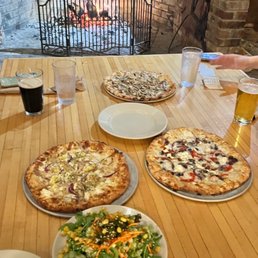 Delicious flatbread pizzas and corn-topped carrot ribbon salad